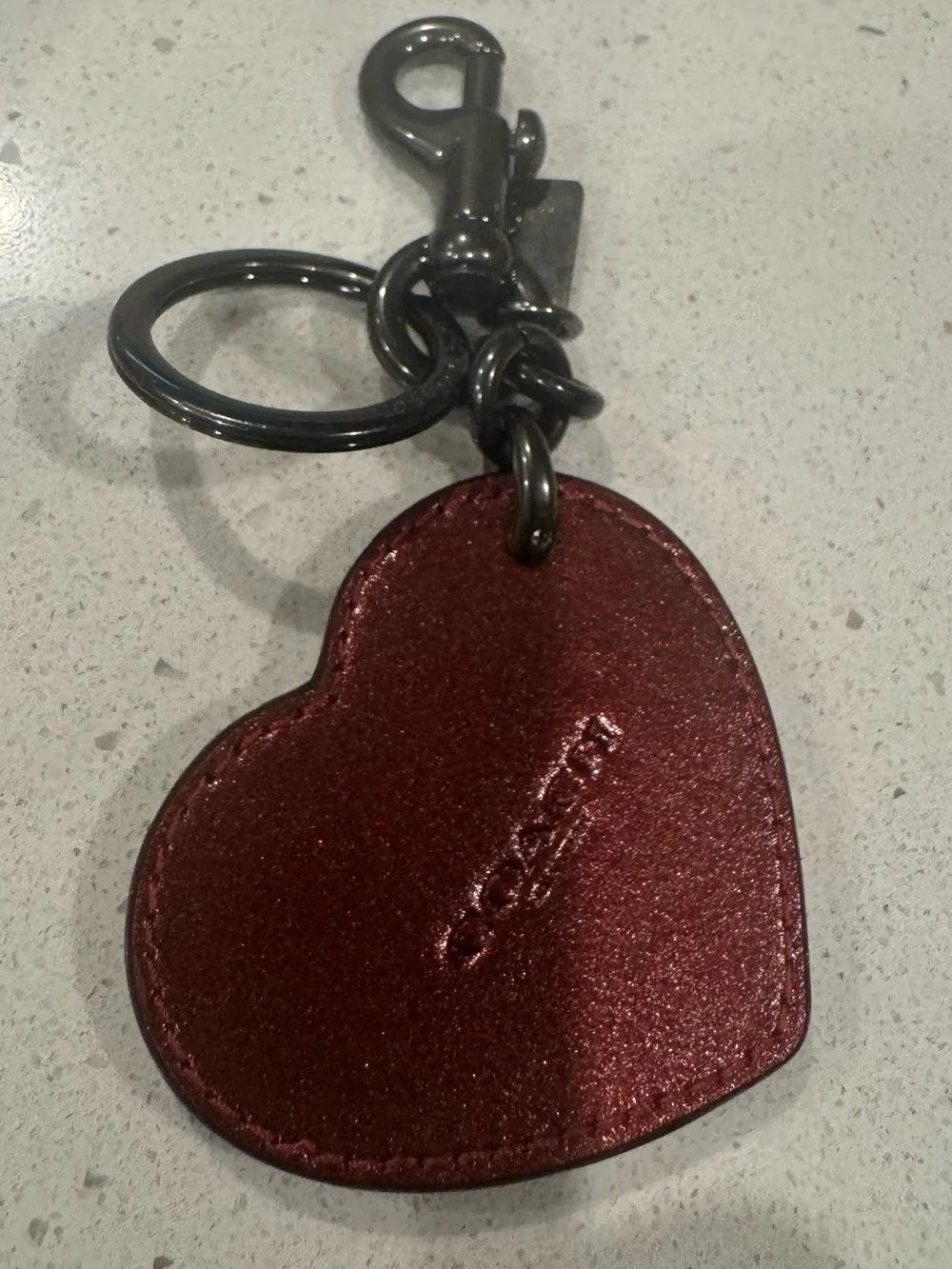 Coach red metallic